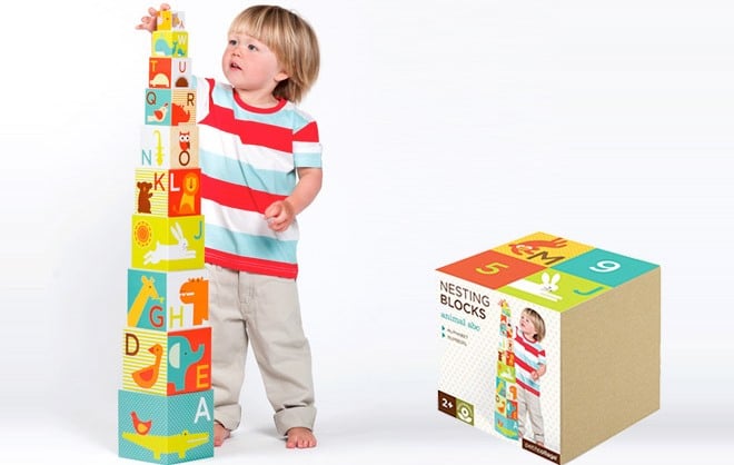 babies stacking blocks