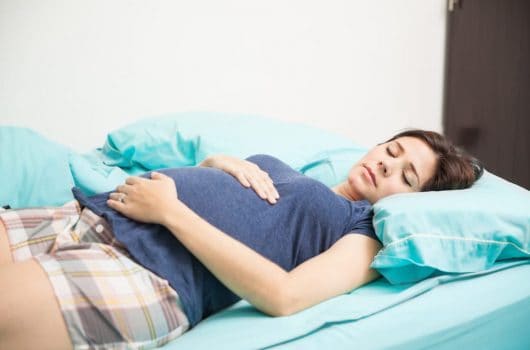 Sleeping On Back During Pregnancy - Is It Safe? - LittleOneMag