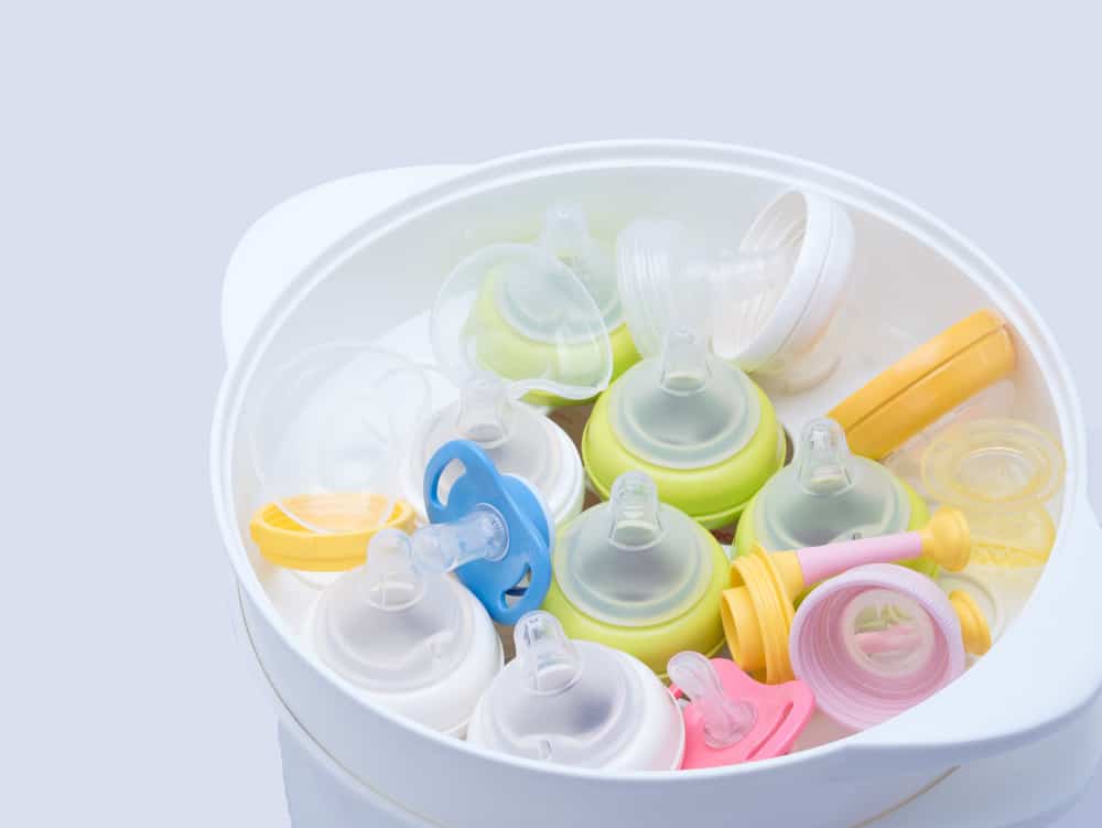 Baby bottles in sterilizing pot