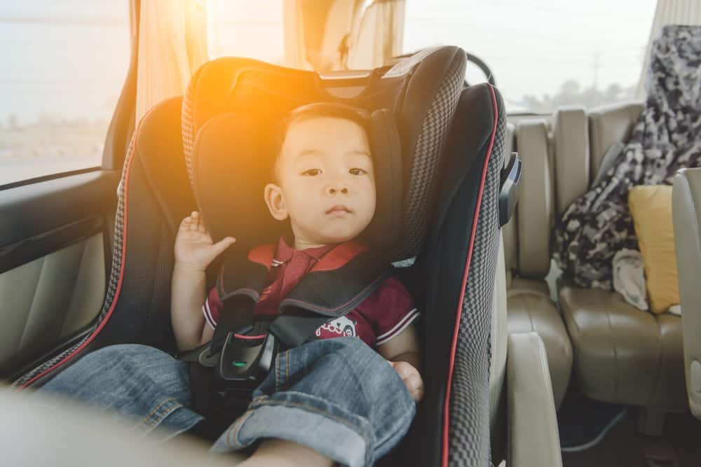 child in booster seat