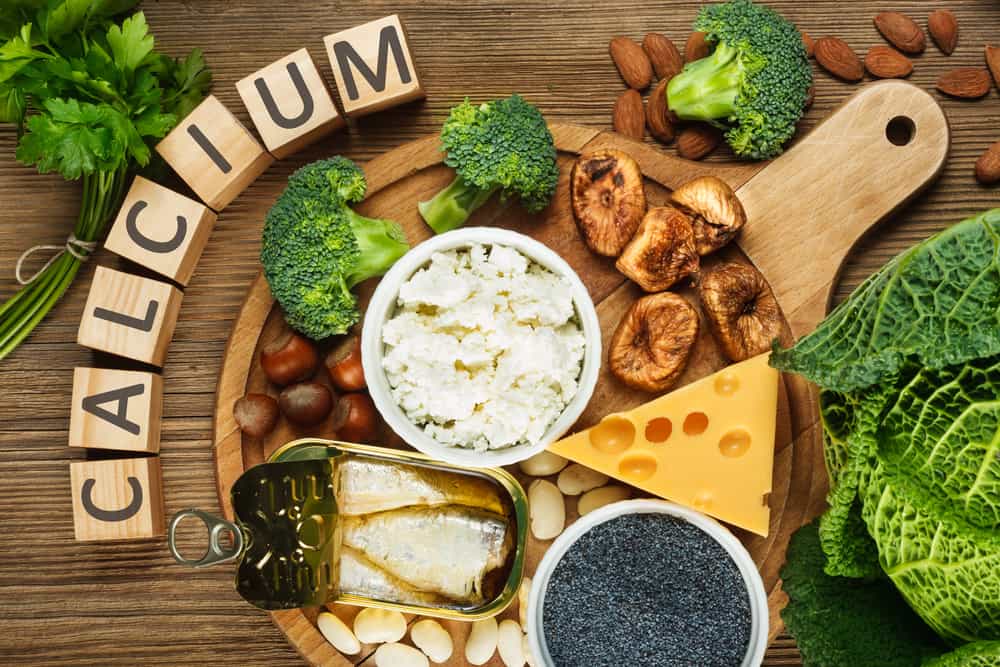 calcium-rich foods on a wooden board