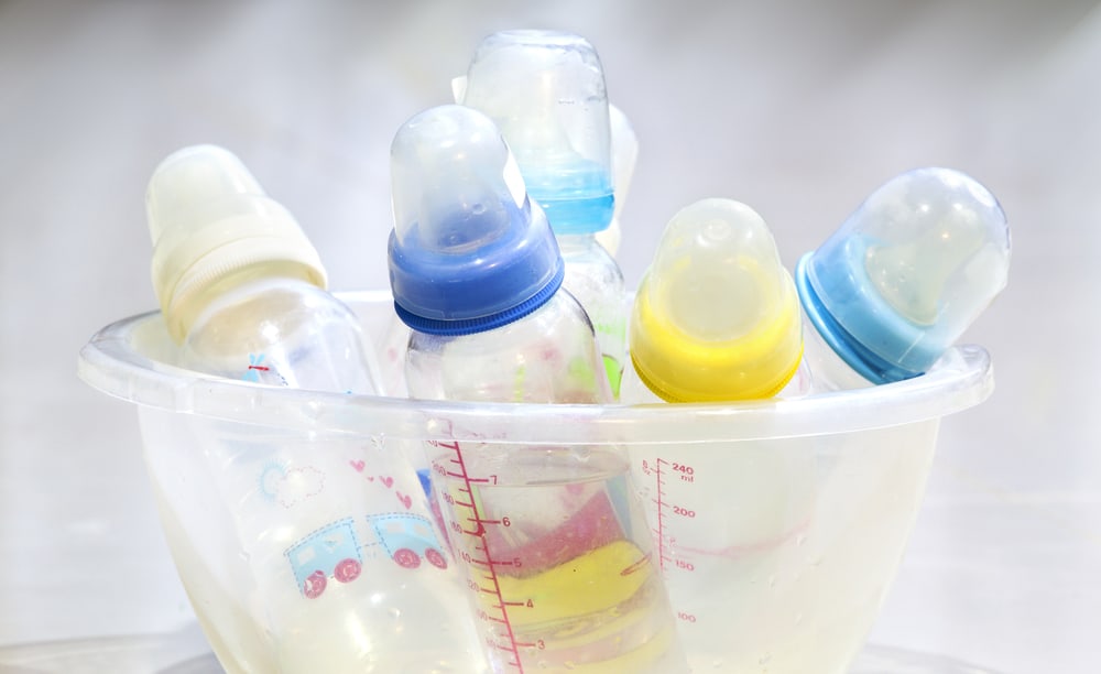 baby bottles in a bowl