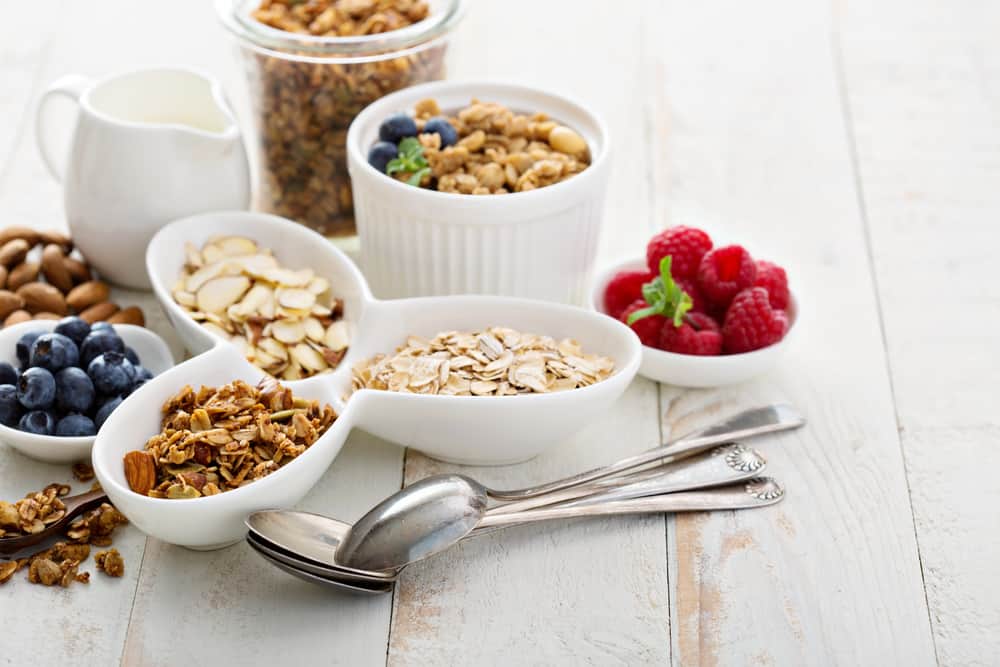 granola and fruits on a table