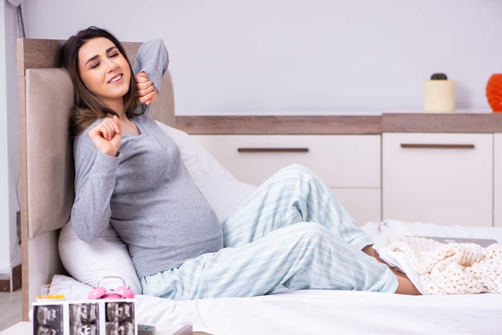 pregnant women getting out of bed