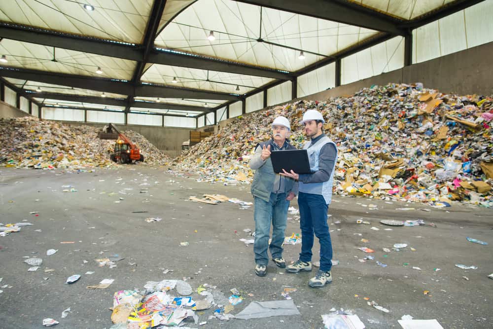 workmen at recycling center